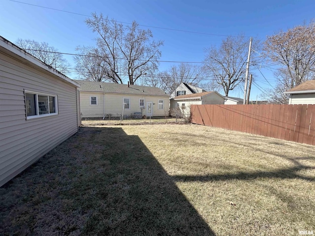 view of yard with fence