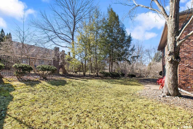 view of yard featuring fence