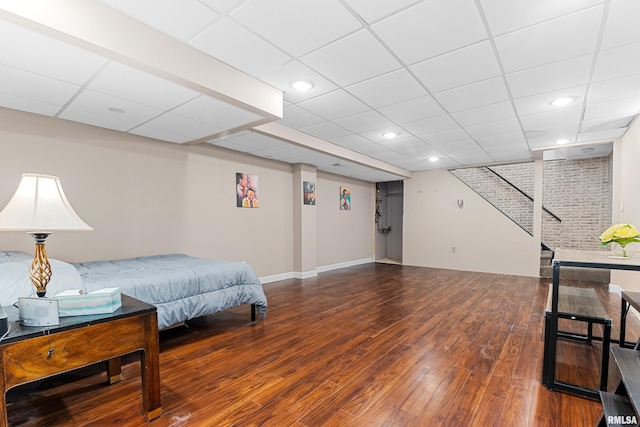 interior space featuring stairs, recessed lighting, wood finished floors, and baseboards