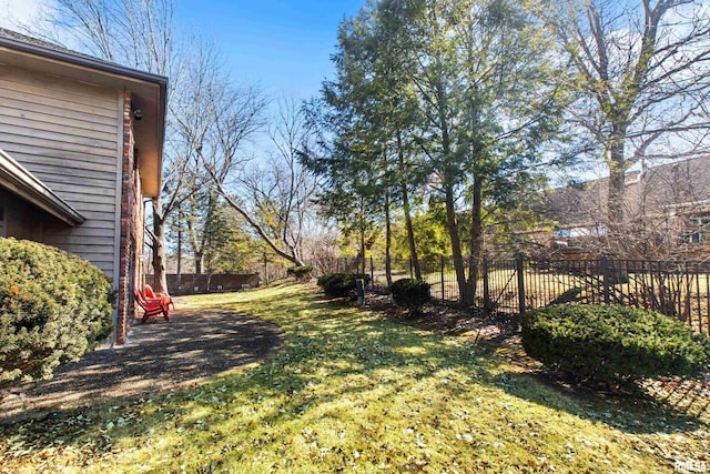 view of yard with fence