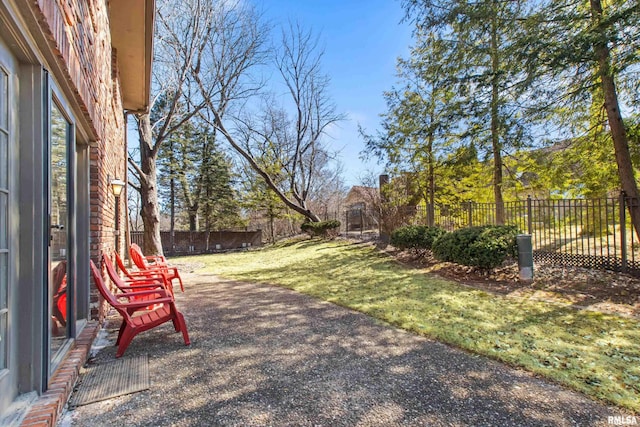 view of yard featuring a patio and a fenced backyard