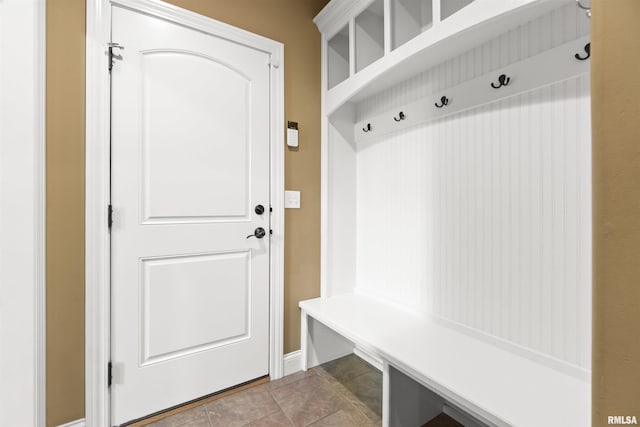 mudroom with tile patterned flooring