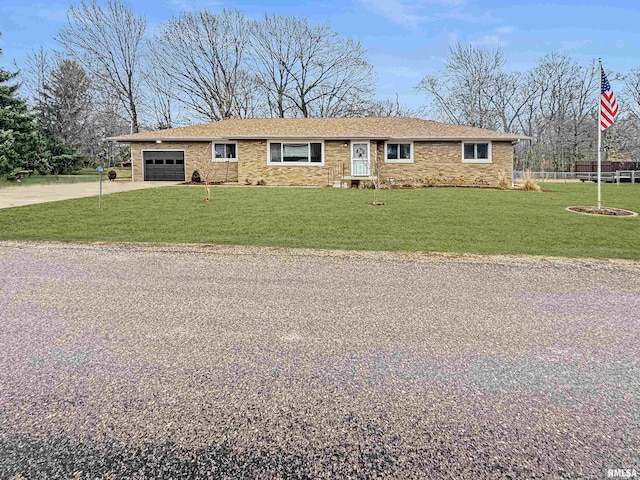 ranch-style house featuring an attached garage, brick siding, fence, concrete driveway, and a front yard