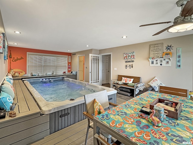 kitchen with recessed lighting, visible vents, wood finished floors, and a ceiling fan