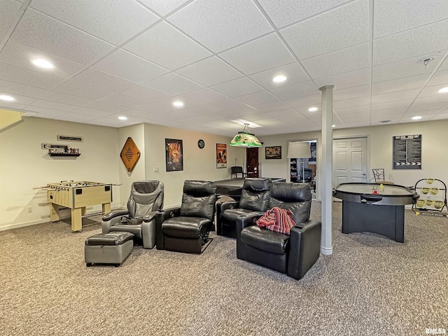 home theater room with recessed lighting, a drop ceiling, baseboards, and carpet flooring