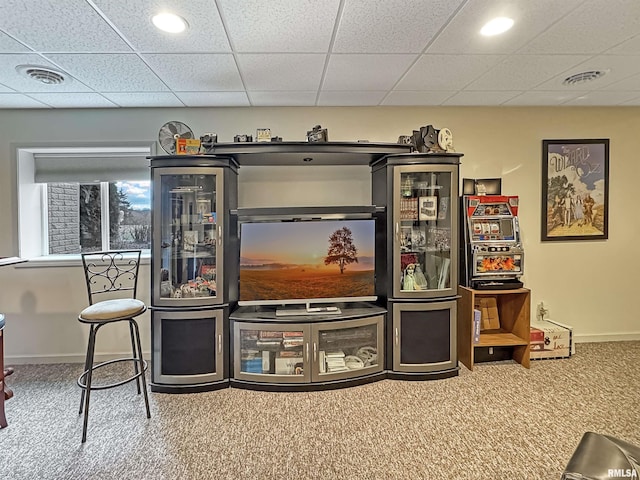 bar with visible vents, baseboards, and carpet