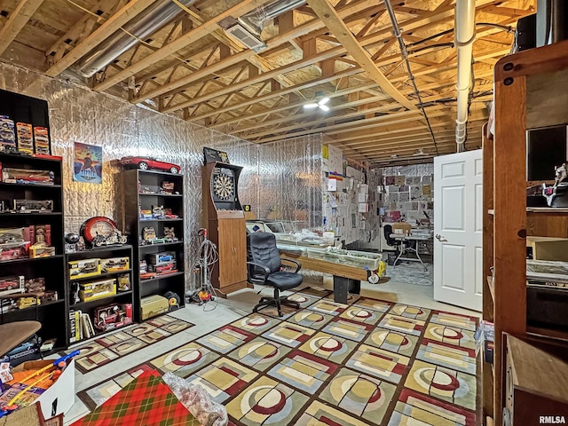 home office with unfinished concrete floors