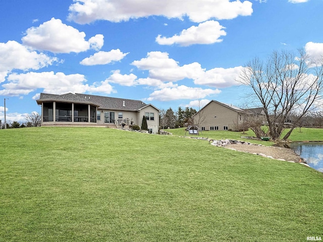 view of yard with a sunroom