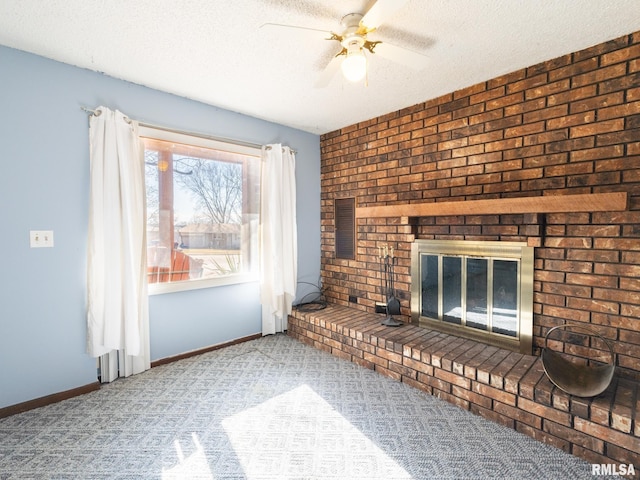 unfurnished living room with baseboards, a textured ceiling, and carpet flooring