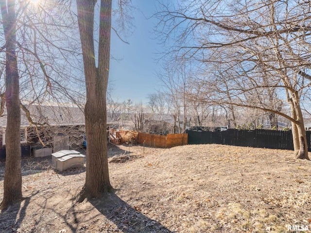 view of yard with fence