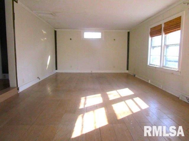 unfurnished room with plenty of natural light