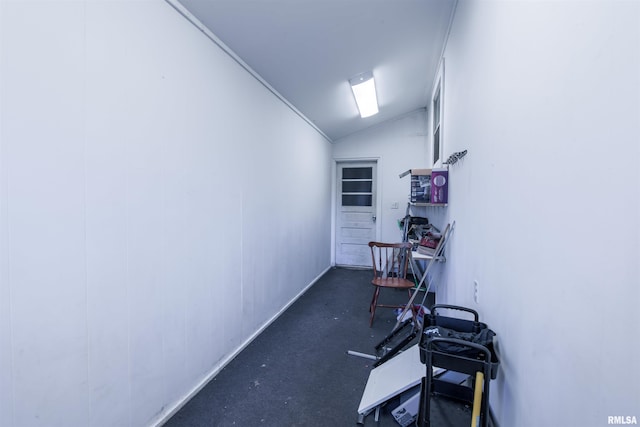 workout room featuring lofted ceiling