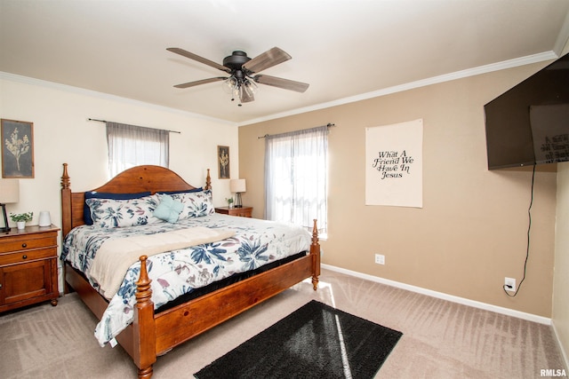 bedroom featuring baseboards, ornamental molding, a ceiling fan, and light colored carpet