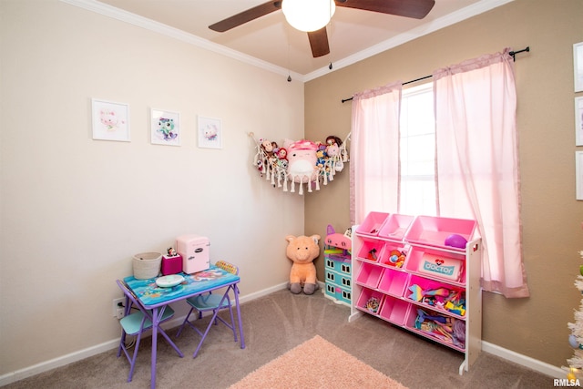 rec room with carpet floors, baseboards, and crown molding