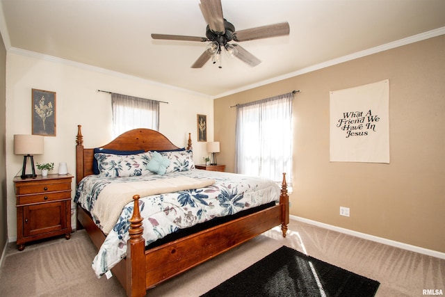 bedroom featuring baseboards, ornamental molding, a ceiling fan, and light colored carpet