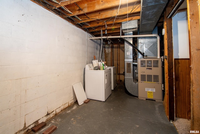 unfinished below grade area featuring washer and dryer