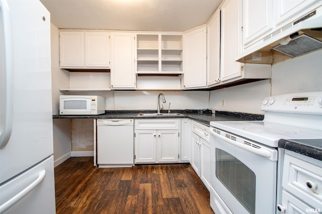 kitchen featuring white appliances, dark wood finished floors, under cabinet range hood, open shelves, and a sink