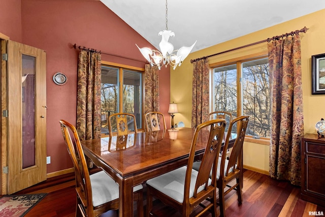 dining area featuring baseboards, lofted ceiling, a notable chandelier, and dark wood-style floors