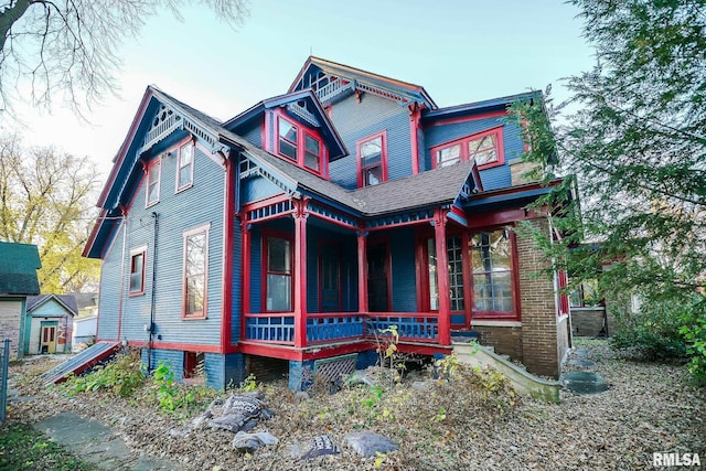 victorian home featuring covered porch