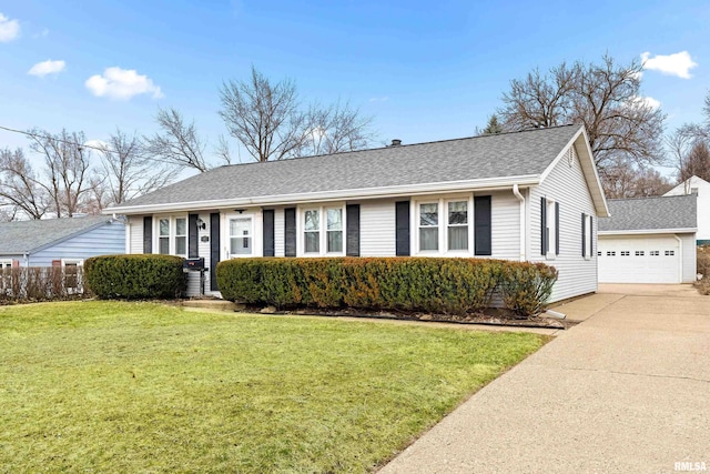 single story home featuring a shingled roof, a detached garage, a front yard, and fence