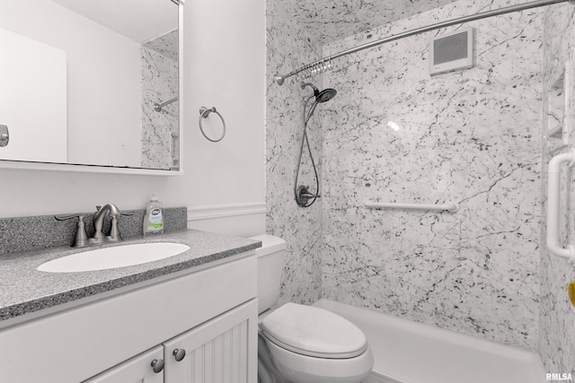 bathroom featuring visible vents, toilet, vanity, and a shower