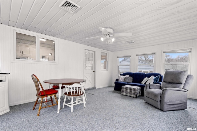 sunroom with visible vents and ceiling fan