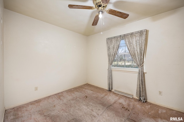 unfurnished room with carpet flooring, baseboards, visible vents, and ceiling fan