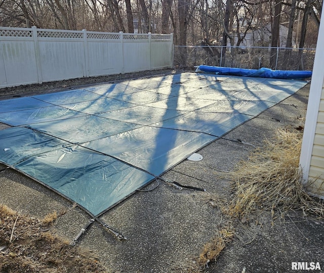 view of pool with a fenced in pool and a fenced backyard