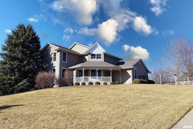 view of front of home featuring a porch and a front lawn