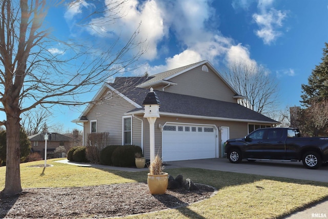 view of side of property featuring a lawn, an attached garage, concrete driveway, and roof with shingles