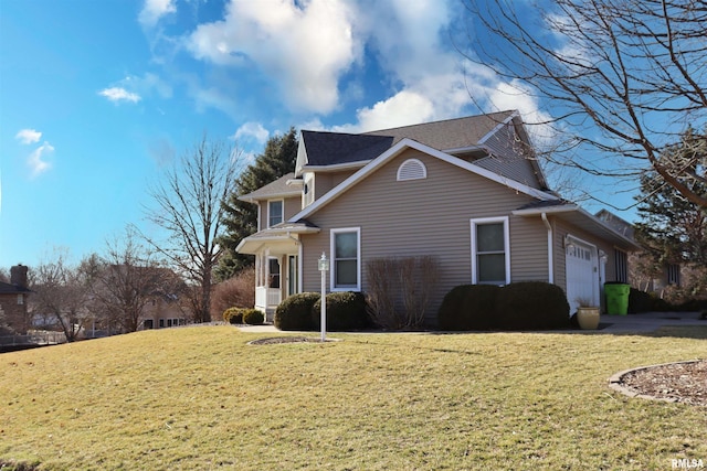 view of property exterior featuring an attached garage and a lawn