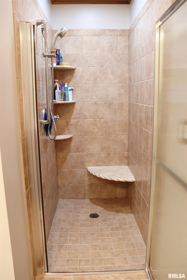 full bath featuring a shower stall