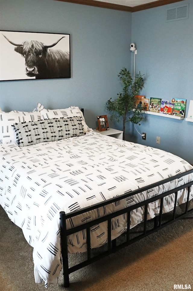 bedroom featuring visible vents