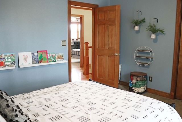 bedroom featuring baseboards