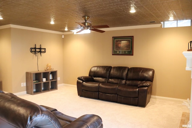 living area featuring baseboards, carpet, and ornamental molding