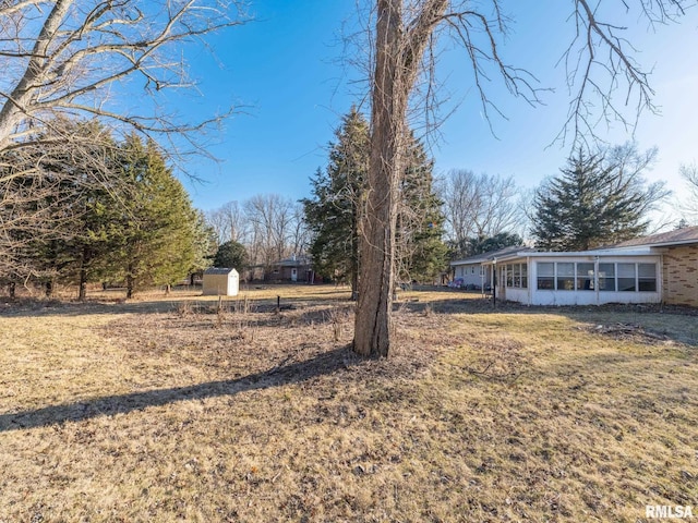 view of yard featuring a sunroom