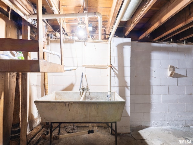 unfinished basement with a sink