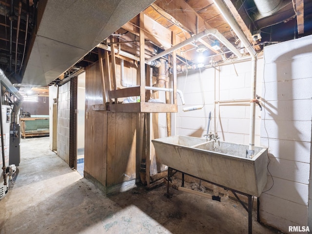 unfinished basement with a sink