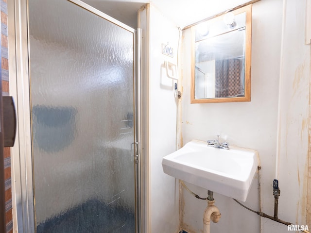 bathroom featuring a shower stall