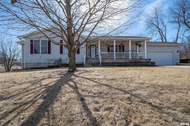 2268 E Knox St, Galesburg, IL 61401 - ranch-style home featuring driveway, a front lawn, a porch, and an attached garage