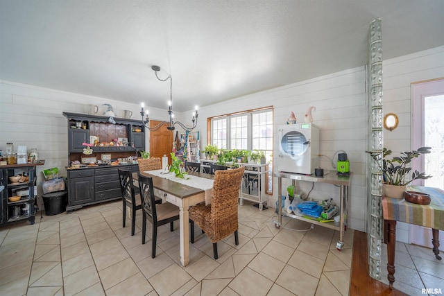 2268 E Knox St, Galesburg, IL 61401 - dining space with light tile patterned floors and a chandelier