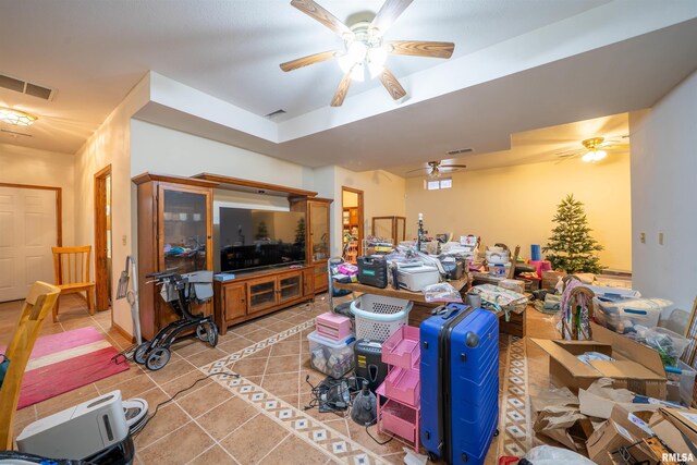 2268 E Knox St, Galesburg, IL 61401 - living room with light tile patterned floors, a ceiling fan, and visible vents