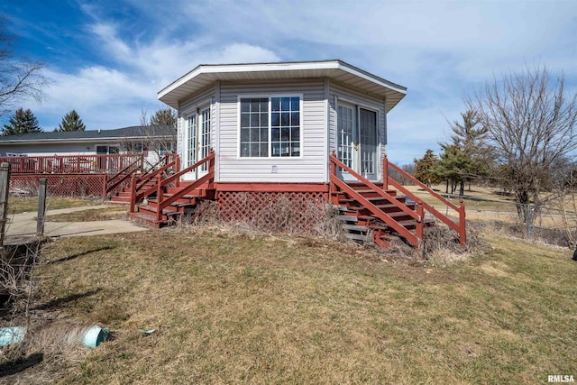 2268 E Knox St, Galesburg, IL 61401 - exterior space featuring a deck, entry steps, fence, a yard, and stairs