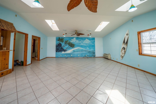 2268 E Knox St, Galesburg, IL 61401 - unfurnished room with lofted ceiling with skylight, light tile patterned flooring, baseboards, and ceiling fan