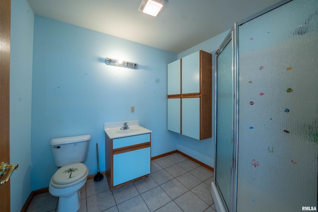 2268 E Knox St, Galesburg, IL 61401 - bathroom with tile patterned floors, a stall shower, toilet, and vanity