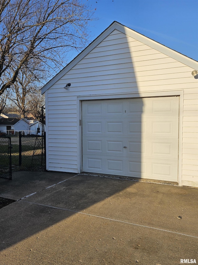 detached garage with fence