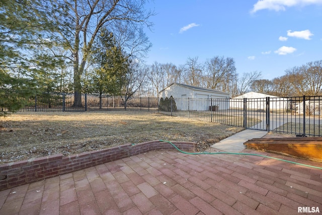 view of yard featuring a patio area, a gate, and fence