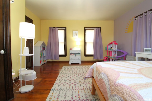 bedroom featuring wood finished floors