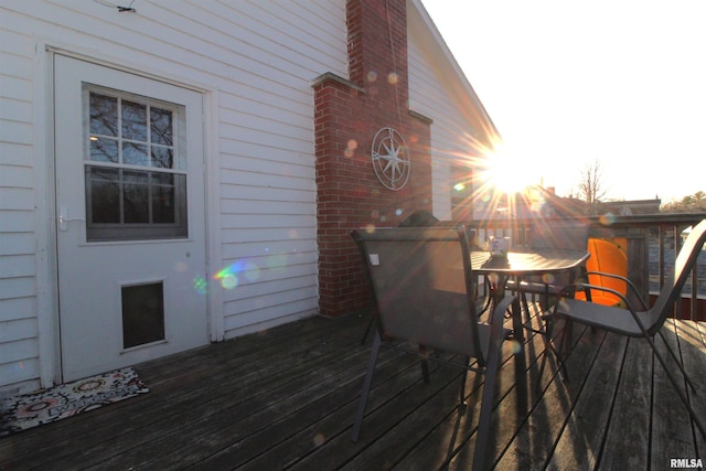 deck featuring outdoor dining area