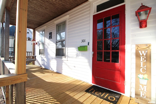 doorway to property featuring a porch